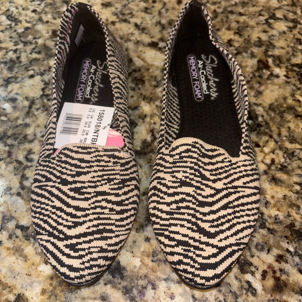 Skechers Women's Black and White Slip-On Shoes